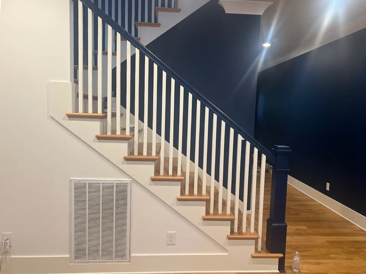 interior painting project house walls and staircase blue and white