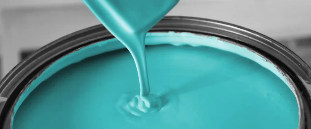 a can of turquoise paint