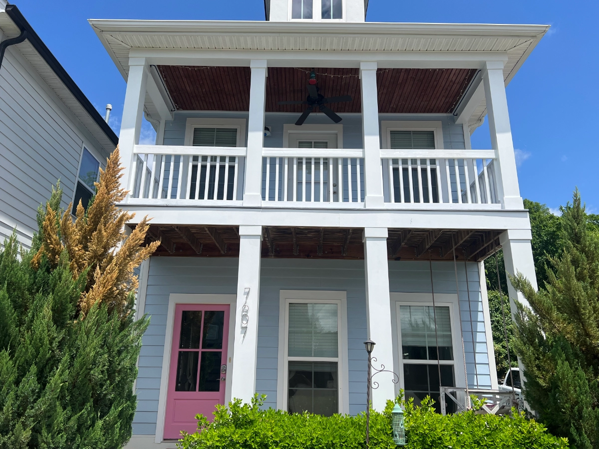 House exterior in soft blue color, painted by New Direction Painting